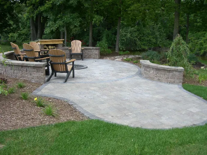 A beautifully crafted natural stone sitting wall with integrated seating, blending functionality and aesthetic appeal.